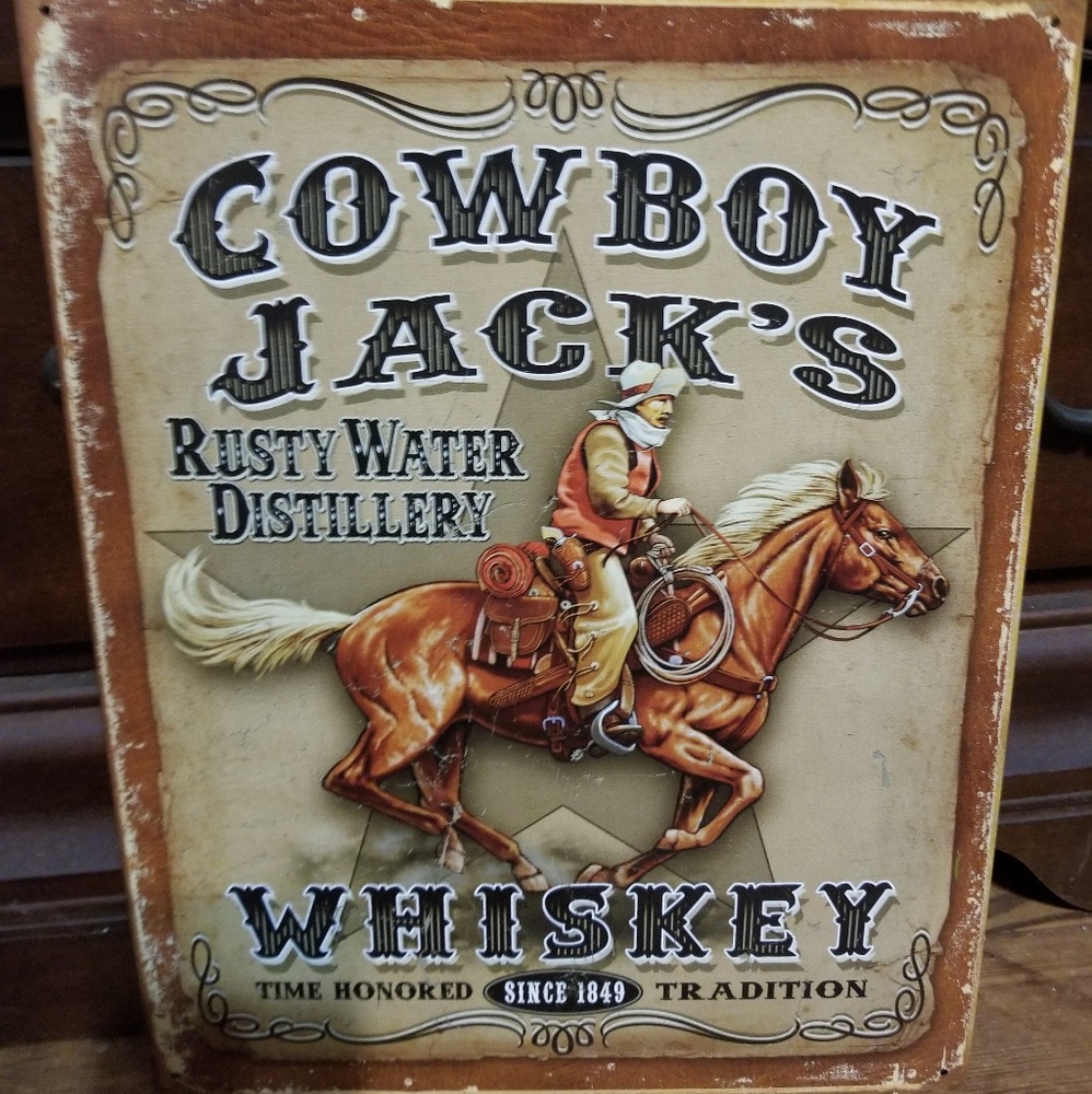 Cowboy Jack Whiskey tin sign